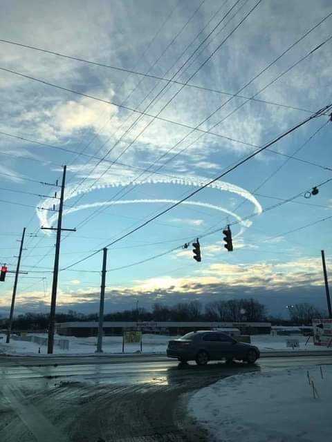 An image of a "cloaked" Starship hovering in a winter sky whose outline is revealed by ice accumulated on the exterior. 
