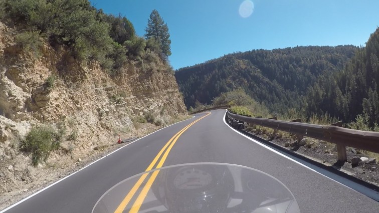 POV riding a motorcycle in Oak Creek Canyon.
