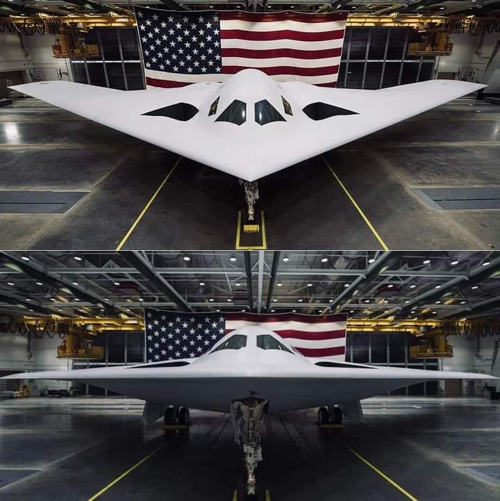 A stealth fighter jet in a hanger. 