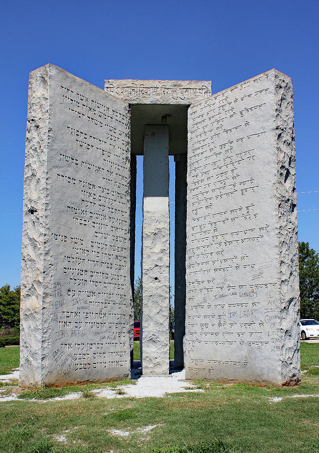 A photo of the Georgia Guidestones which before being demolished, advocated for population reduction. 