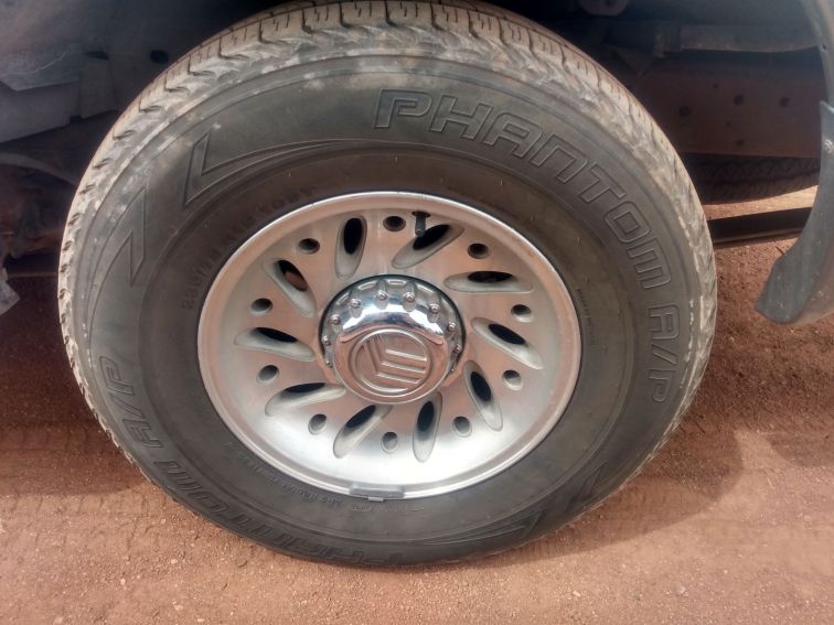 A closeup of an SUV wheel.