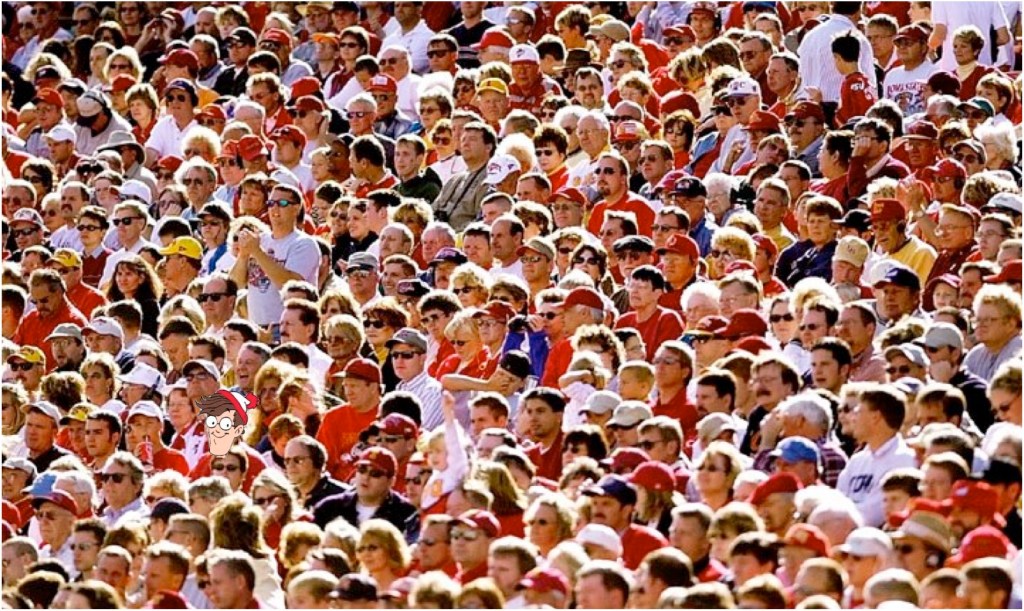 An image of a large group of people with focused attention.