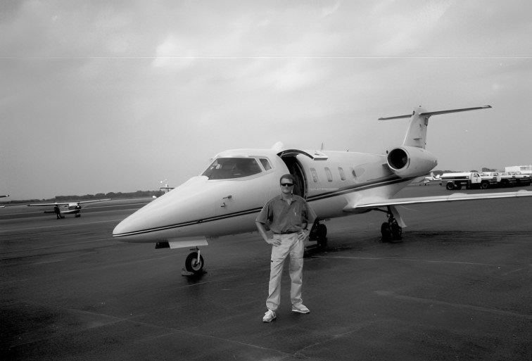 Daniel Wolfert getting ready to board the company Lear Jet.